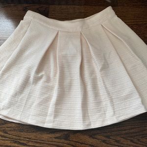 Pleated cream skirt